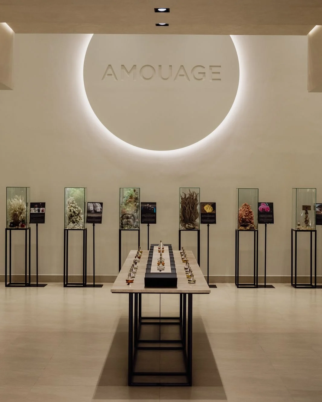 The Amouage exhibition hall with a central perfume display
